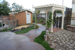 several different hardscaped patio designs complete with a pergola