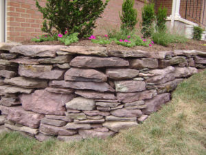 close up of red stone wall