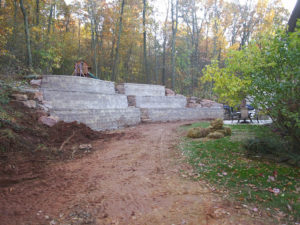 3 tier retaining wall with steps in the middle