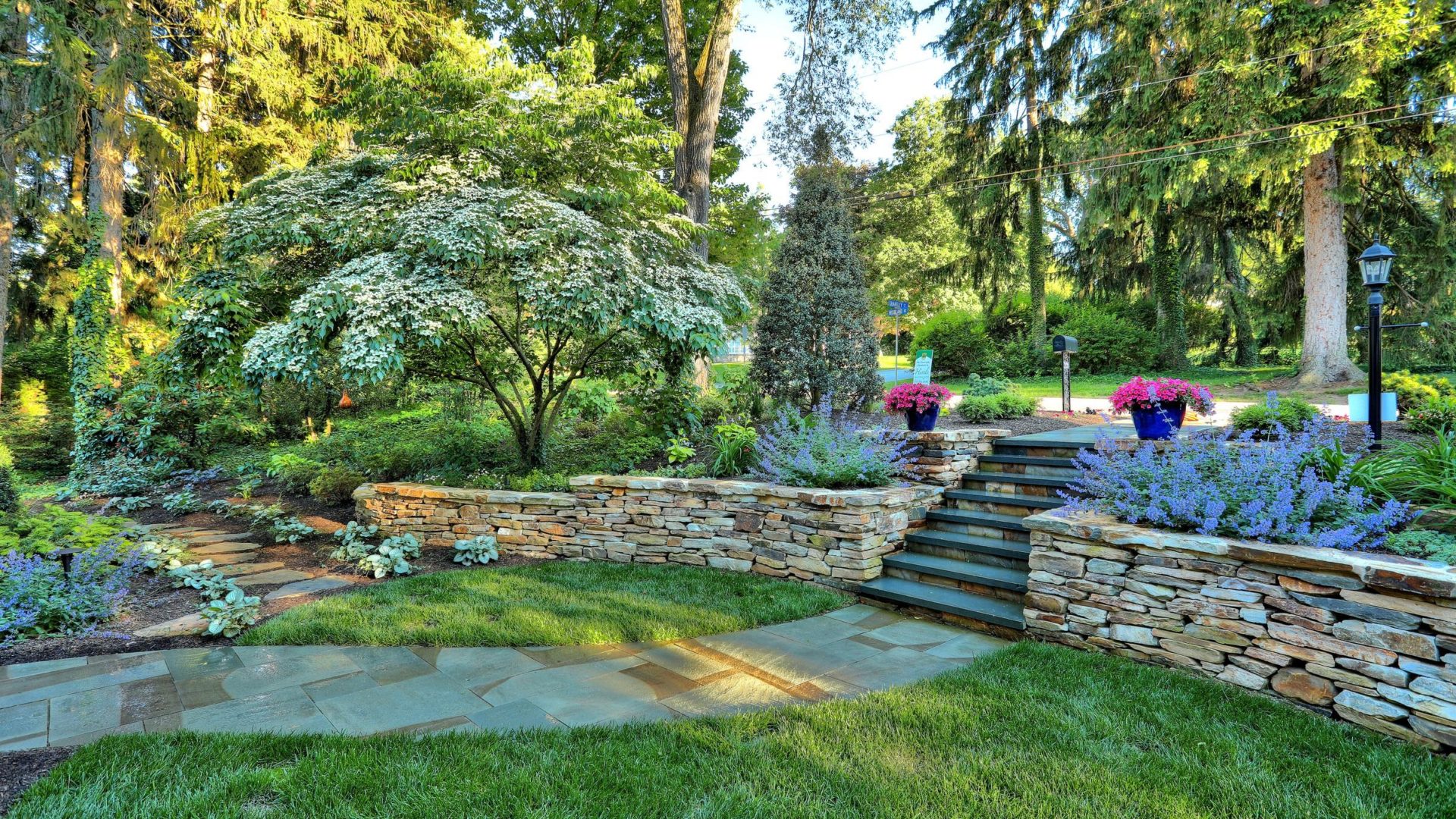 a staircase and flowerbeds showcasing Hively's landscaping and hardscaping services